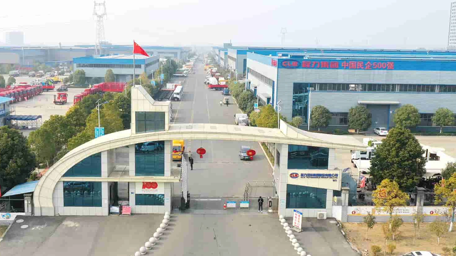 Aerial view of the CLW Group campus in Suizhou, with the China Top 500 Private Enterprises banner on the workshop façade