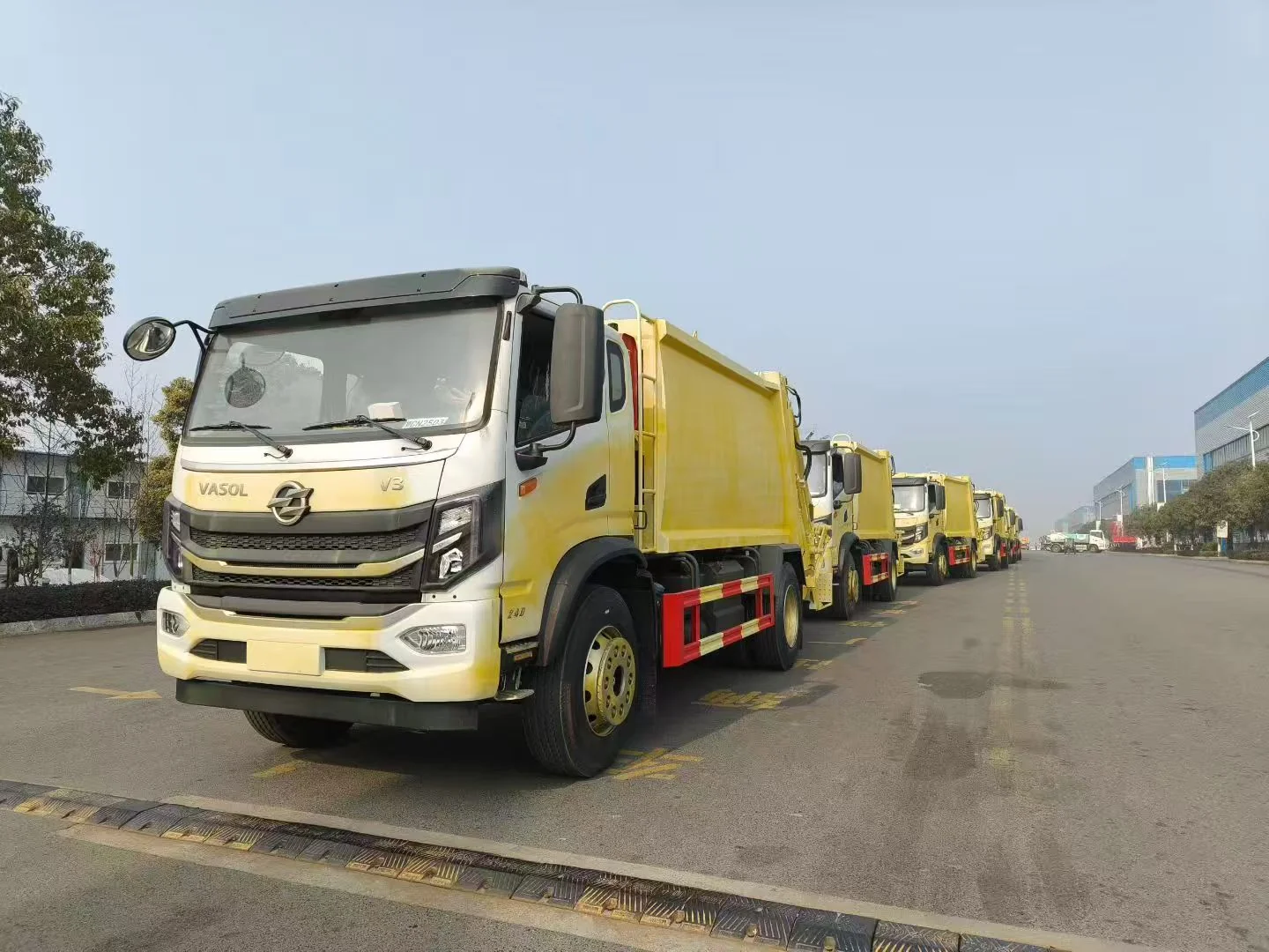 garbage truck convoy on test road