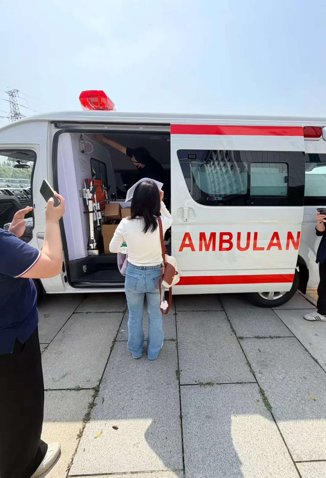 customer inspecting ambulance interior