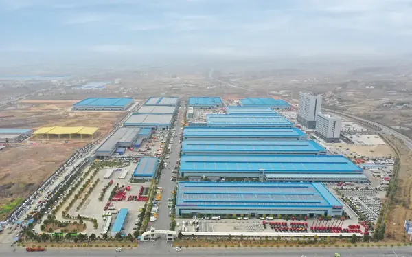 CLW blue-roof production workshops and finished truck staging yard in Suizhou
